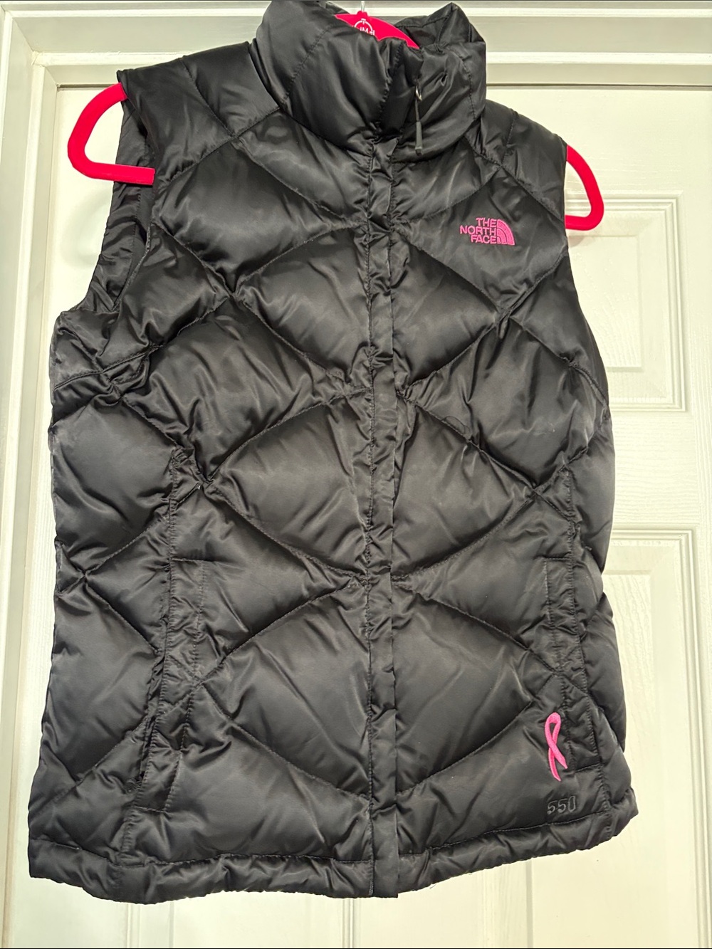 The North Face Black Vest with Pink Logo and Ribbon